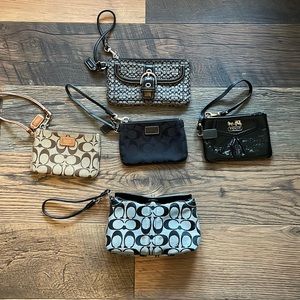 5 Coach wristlets